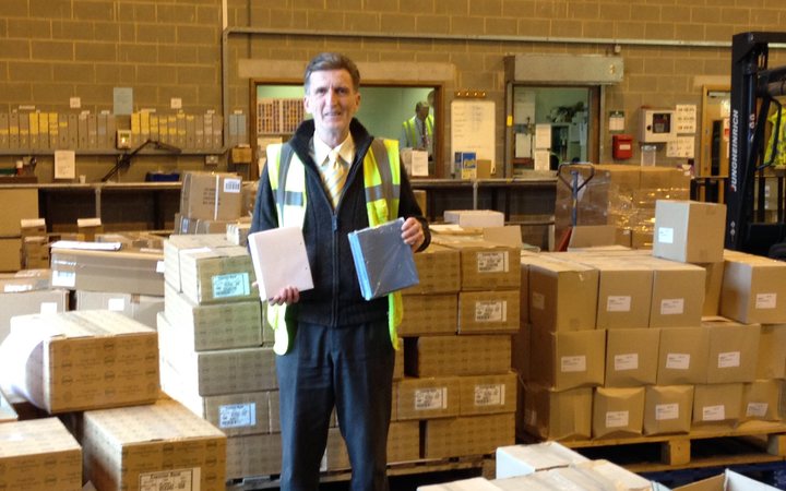 Boxes of brand-new exercise books donated by Hertfordshire County Council