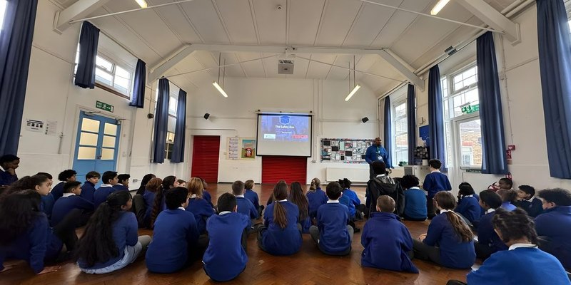 A full school hall of London pupils at a Jarrett Foundation session