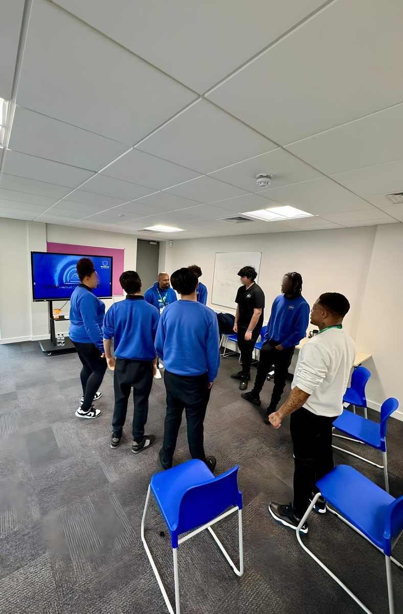 Young people in a standing group session